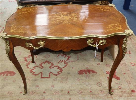 A Louis XVI style gilt metal mounted marquetry inlaid side table W.102cm